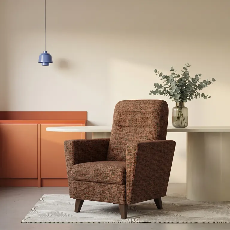 Custom upholstered armchair by EWAcompany
